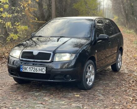 Черный Шкода Фабия, объемом двигателя 1.2 л и пробегом 380 тыс. км за 3100 $, фото 1 на Automoto.ua