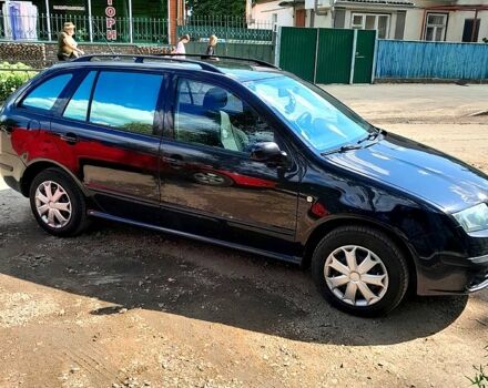 Черный Шкода Фабия, объемом двигателя 1.4 л и пробегом 207 тыс. км за 4300 $, фото 4 на Automoto.ua