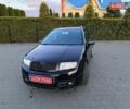 Черный Шкода Фабия, объемом двигателя 1.4 л и пробегом 190 тыс. км за 4750 $, фото 1 на Automoto.ua