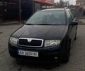 Черный Шкода Фабия, объемом двигателя 1.2 л и пробегом 225 тыс. км за 3200 $, фото 1 на Automoto.ua