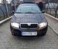 Черный Шкода Фабия, объемом двигателя 1.4 л и пробегом 200 тыс. км за 4200 $, фото 1 на Automoto.ua