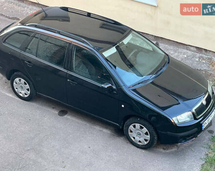 Черный Шкода Фабия, объемом двигателя 1.4 л и пробегом 270 тыс. км за 3950 $, фото 17 на Automoto.ua