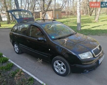 Черный Шкода Фабия, объемом двигателя 1.39 л и пробегом 159 тыс. км за 4800 $, фото 1 на Automoto.ua