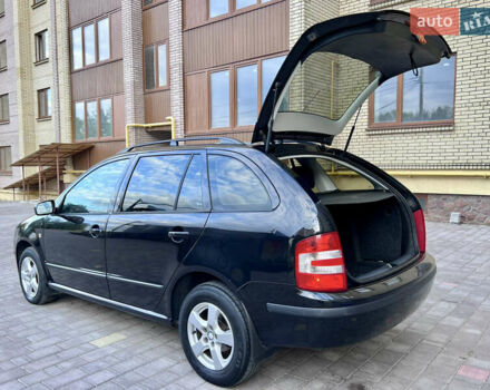 Черный Шкода Фабия, объемом двигателя 1.4 л и пробегом 162 тыс. км за 3999 $, фото 55 на Automoto.ua