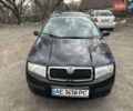 Черный Шкода Фабия, объемом двигателя 1.4 л и пробегом 150 тыс. км за 3700 $, фото 1 на Automoto.ua