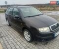 Черный Шкода Фабия, объемом двигателя 1.39 л и пробегом 216 тыс. км за 4500 $, фото 2 на Automoto.ua