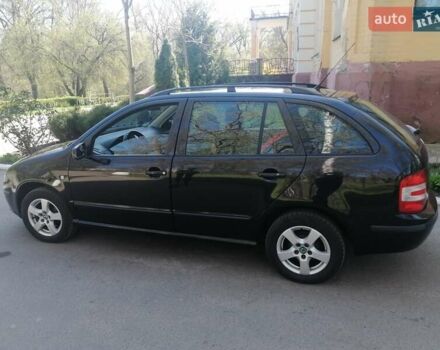 Черный Шкода Фабия, объемом двигателя 1.39 л и пробегом 159 тыс. км за 4800 $, фото 3 на Automoto.ua