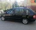 Черный Шкода Фабия, объемом двигателя 1.39 л и пробегом 159 тыс. км за 4800 $, фото 3 на Automoto.ua