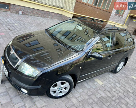 Черный Шкода Фабия, объемом двигателя 1.4 л и пробегом 162 тыс. км за 3999 $, фото 3 на Automoto.ua