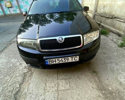 Черный Шкода Фабия, объемом двигателя 1.2 л и пробегом 265 тыс. км за 3500 $, фото 6 на Automoto.ua