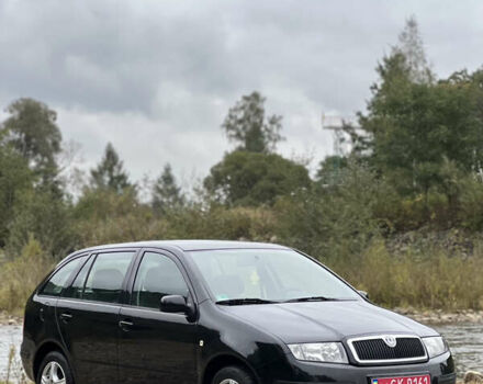 Черный Шкода Фабия, объемом двигателя 1.4 л и пробегом 220 тыс. км за 4450 $, фото 2 на Automoto.ua