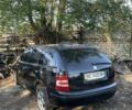 Черный Шкода Фабия, объемом двигателя 1.2 л и пробегом 200 тыс. км за 400 $, фото 1 на Automoto.ua