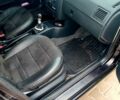 Черный Шкода Фабия, объемом двигателя 1.4 л и пробегом 262 тыс. км за 4300 $, фото 3 на Automoto.ua