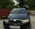 Черный Шкода Фабия, объемом двигателя 1.39 л и пробегом 220 тыс. км за 4650 $, фото 2 на Automoto.ua