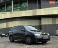 Черный Шкода Фабия, объемом двигателя 1.39 л и пробегом 349 тыс. км за 4590 $, фото 1 на Automoto.ua