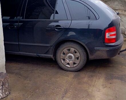 Черный Шкода Фабия, объемом двигателя 1.4 л и пробегом 294 тыс. км за 5100 $, фото 1 на Automoto.ua