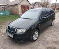 Черный Шкода Фабия, объемом двигателя 1.4 л и пробегом 232 тыс. км за 4999 $, фото 2 на Automoto.ua