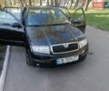 Черный Шкода Фабия, объемом двигателя 1.39 л и пробегом 159 тыс. км за 4800 $, фото 1 на Automoto.ua