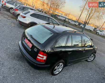 Черный Шкода Фабия, объемом двигателя 1.4 л и пробегом 200 тыс. км за 4999 $, фото 9 на Automoto.ua