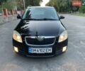 Черный Шкода Фабия, объемом двигателя 1.39 л и пробегом 189 тыс. км за 5400 $, фото 1 на Automoto.ua