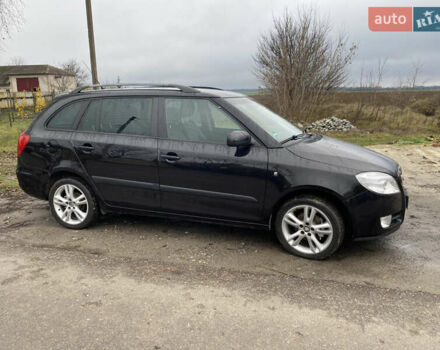 Черный Шкода Фабия, объемом двигателя 1.39 л и пробегом 210 тыс. км за 5800 $, фото 3 на Automoto.ua