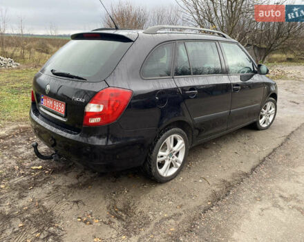 Черный Шкода Фабия, объемом двигателя 1.39 л и пробегом 210 тыс. км за 5800 $, фото 1 на Automoto.ua