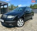 Черный Шкода Фабия, объемом двигателя 1.4 л и пробегом 224 тыс. км за 5600 $, фото 1 на Automoto.ua