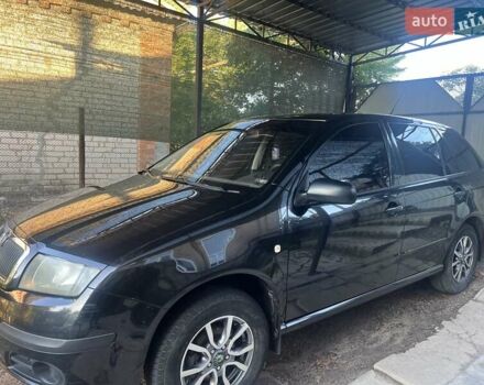 Черный Шкода Фабия, объемом двигателя 1.2 л и пробегом 183 тыс. км за 6000 $, фото 1 на Automoto.ua