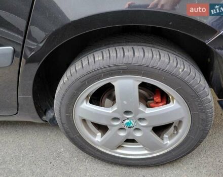 Черный Шкода Фабия, объемом двигателя 1.4 л и пробегом 233 тыс. км за 5300 $, фото 28 на Automoto.ua