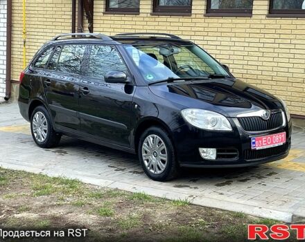 Черный Шкода Фабия, объемом двигателя 1.6 л и пробегом 185 тыс. км за 6100 $, фото 1 на Automoto.ua