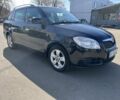 Черный Шкода Фабия, объемом двигателя 1.4 л и пробегом 203 тыс. км за 4999 $, фото 1 на Automoto.ua