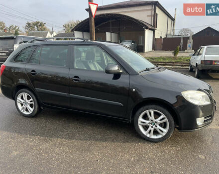 Черный Шкода Фабия, объемом двигателя 1.6 л и пробегом 169 тыс. км за 6350 $, фото 2 на Automoto.ua