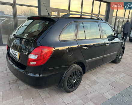 Черный Шкода Фабия, объемом двигателя 1.39 л и пробегом 222 тыс. км за 4750 $, фото 6 на Automoto.ua