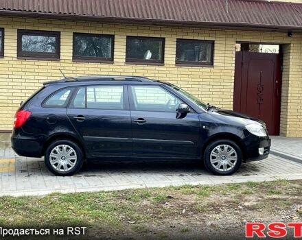 Черный Шкода Фабия, объемом двигателя 1.6 л и пробегом 185 тыс. км за 6100 $, фото 2 на Automoto.ua
