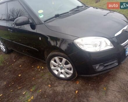 Черный Шкода Фабия, объемом двигателя 1.39 л и пробегом 186 тыс. км за 4750 $, фото 2 на Automoto.ua