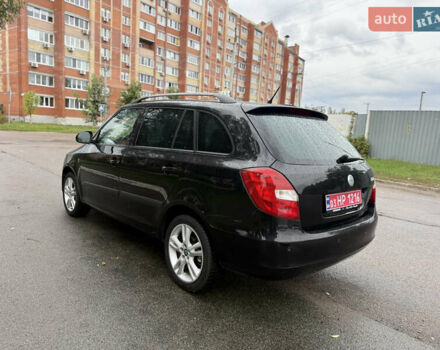 Черный Шкода Фабия, объемом двигателя 1.6 л и пробегом 238 тыс. км за 6800 $, фото 4 на Automoto.ua