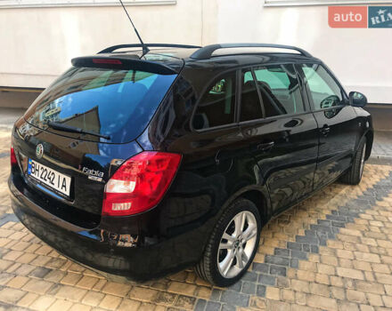Черный Шкода Фабия, объемом двигателя 1.6 л и пробегом 200 тыс. км за 6900 $, фото 1 на Automoto.ua