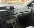 Черный Шкода Фабия, объемом двигателя 1.6 л и пробегом 195 тыс. км за 6500 $, фото 12 на Automoto.ua