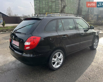 Черный Шкода Фабия, объемом двигателя 1.6 л и пробегом 169 тыс. км за 6350 $, фото 5 на Automoto.ua