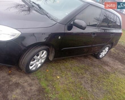Черный Шкода Фабия, объемом двигателя 1.39 л и пробегом 186 тыс. км за 4750 $, фото 5 на Automoto.ua