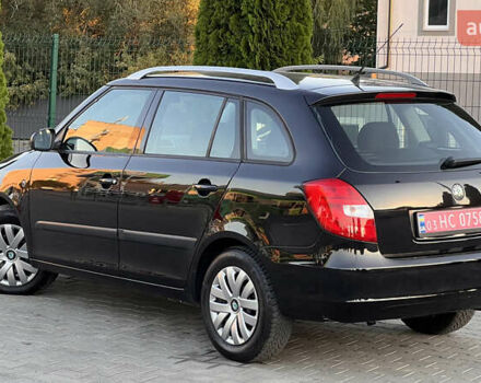 Черный Шкода Фабия, объемом двигателя 1.4 л и пробегом 195 тыс. км за 5850 $, фото 4 на Automoto.ua