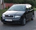 Черный Шкода Фабия, объемом двигателя 1.42 л и пробегом 178 тыс. км за 5400 $, фото 6 на Automoto.ua