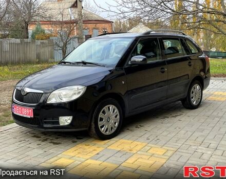 Черный Шкода Фабия, объемом двигателя 1.6 л и пробегом 185 тыс. км за 6100 $, фото 5 на Automoto.ua