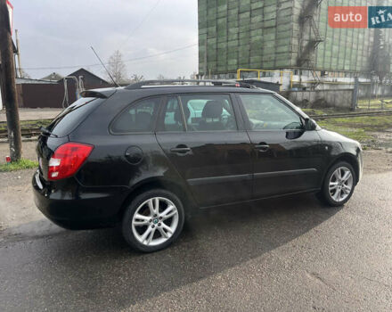 Черный Шкода Фабия, объемом двигателя 1.6 л и пробегом 169 тыс. км за 6350 $, фото 4 на Automoto.ua