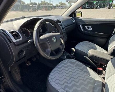 Черный Шкода Фабия, объемом двигателя 1.39 л и пробегом 287 тыс. км за 5000 $, фото 15 на Automoto.ua