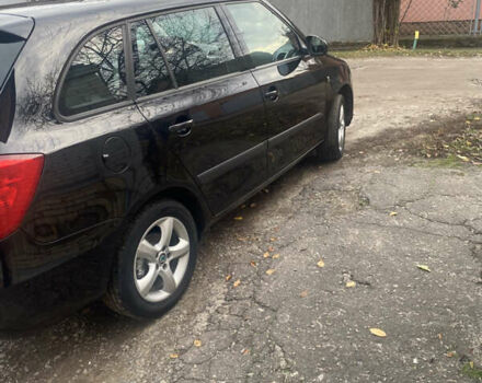 Черный Шкода Фабия, объемом двигателя 1.6 л и пробегом 172 тыс. км за 5950 $, фото 4 на Automoto.ua