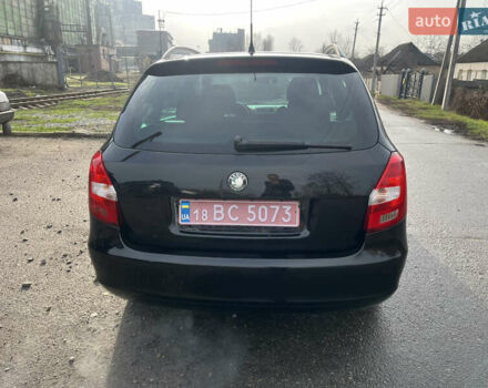Черный Шкода Фабия, объемом двигателя 1.6 л и пробегом 169 тыс. км за 6350 $, фото 8 на Automoto.ua