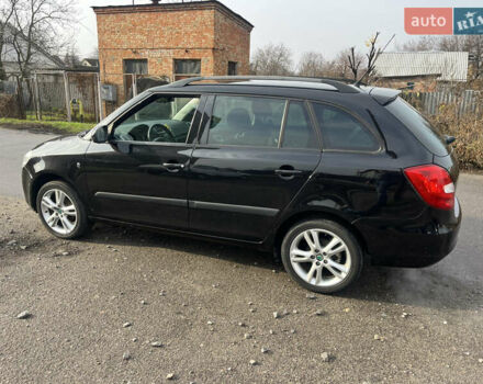Черный Шкода Фабия, объемом двигателя 1.6 л и пробегом 169 тыс. км за 6350 $, фото 11 на Automoto.ua