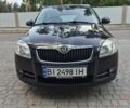Черный Шкода Фабия, объемом двигателя 1.4 л и пробегом 222 тыс. км за 5178 $, фото 1 на Automoto.ua