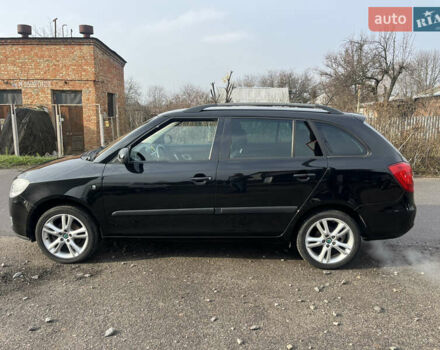 Черный Шкода Фабия, объемом двигателя 1.6 л и пробегом 169 тыс. км за 6350 $, фото 12 на Automoto.ua